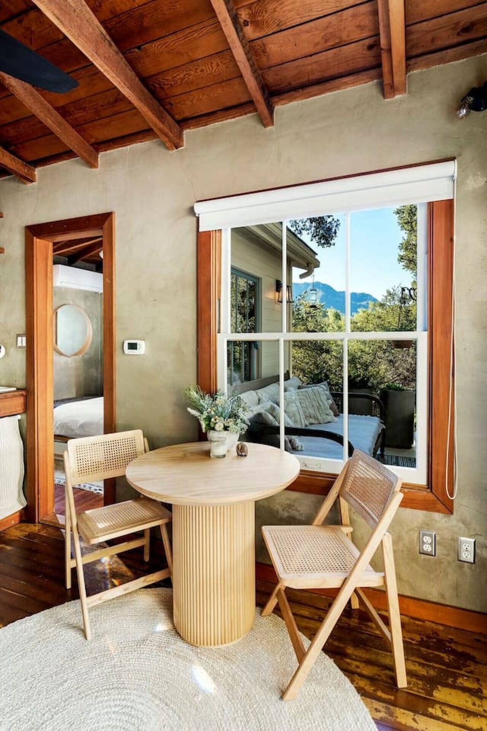 Cozy and intimate dining table, perfect for a relaxing stay.