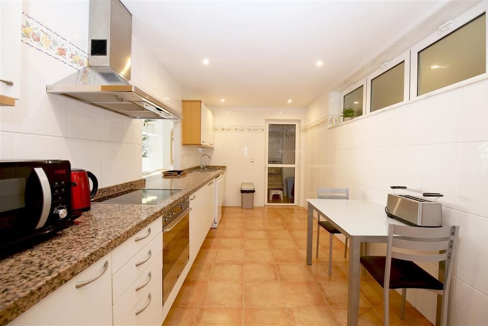 Spacious kitchen is fully fitted with all the appliances