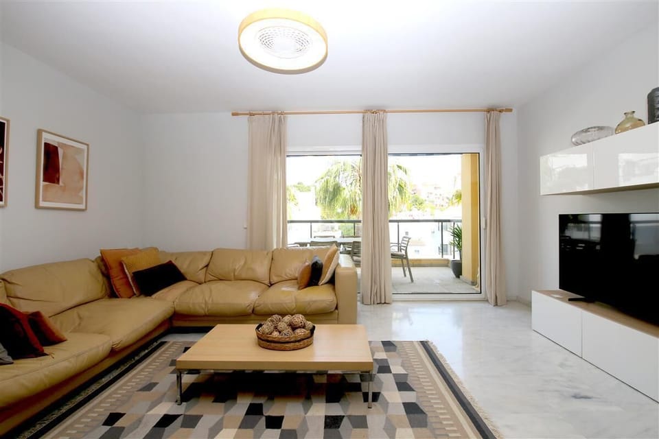 Another picture of the bright lounge with comfortable seating