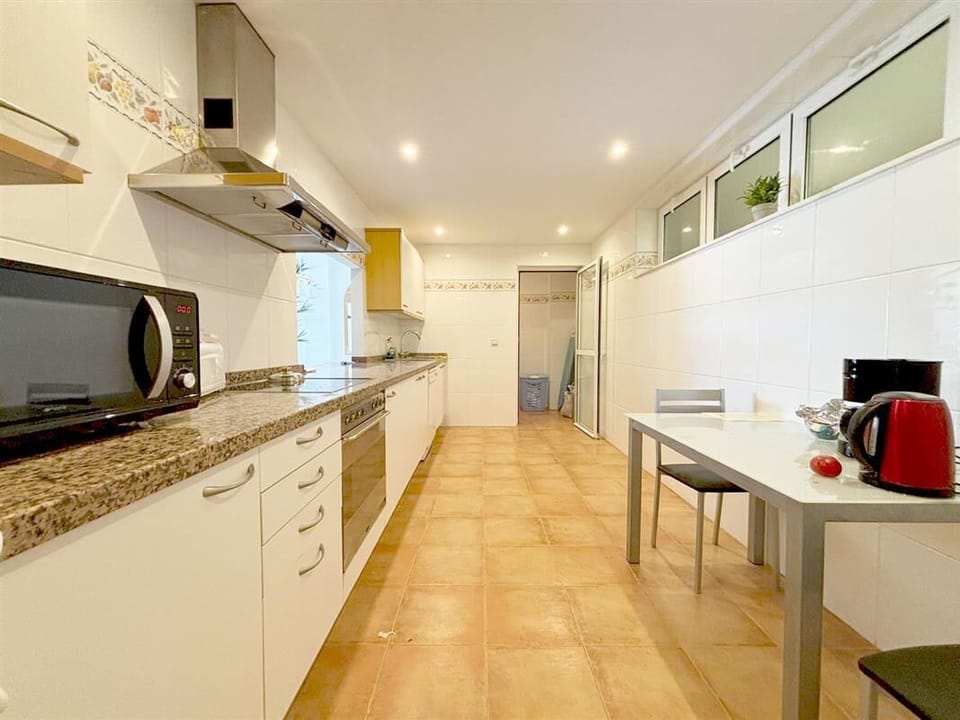 Spacious kitchen is fully fitted with all the appliances