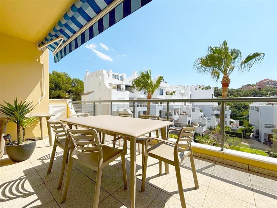 Outdoor dining area for six guests on the terrace with sea views