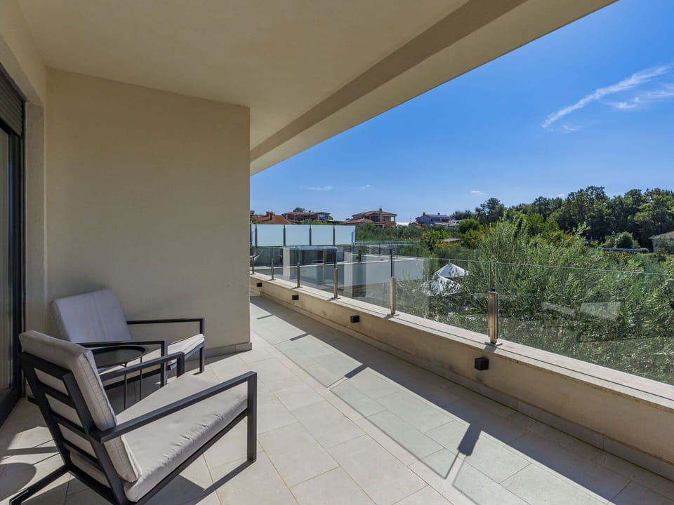 Sky, Furniture, Building, Shade, Cloud, Table, Condominium, Wood, Tree, Floor