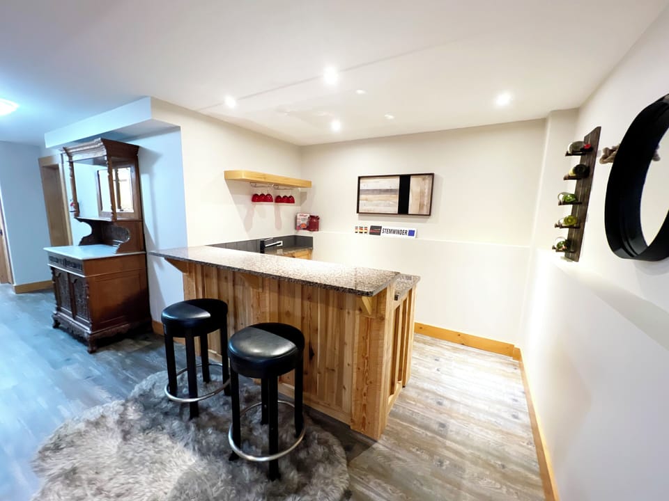 Pull up a stool at the bar on the lower level.