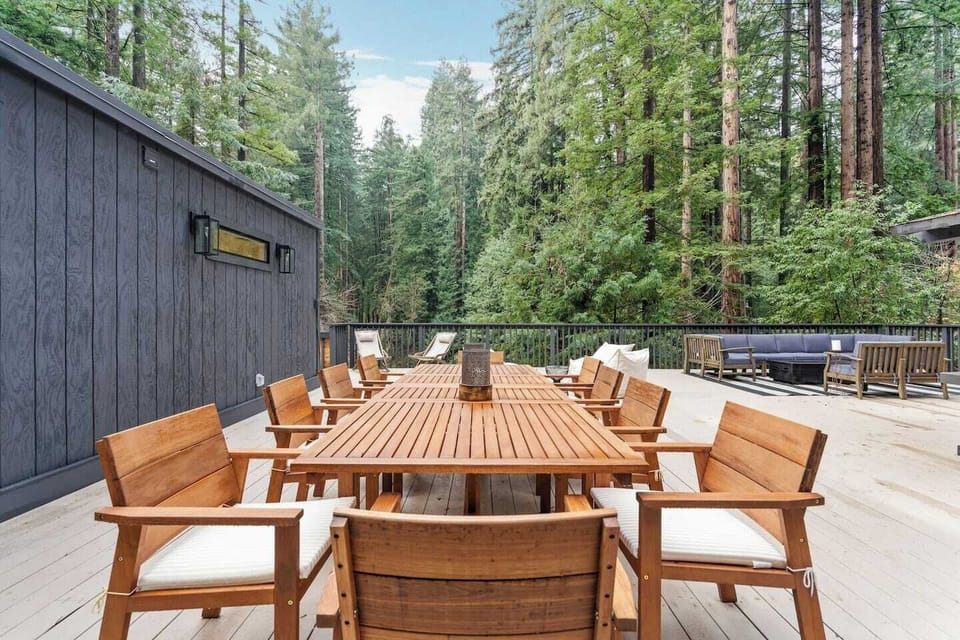 A gathering space like no other—this patio just off the kitchen offers dining, seating, and a front-row seat to nature.