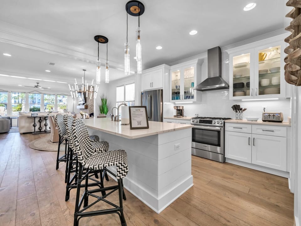 The kitchen is fully stocked, and includes a great breakfast bar!
