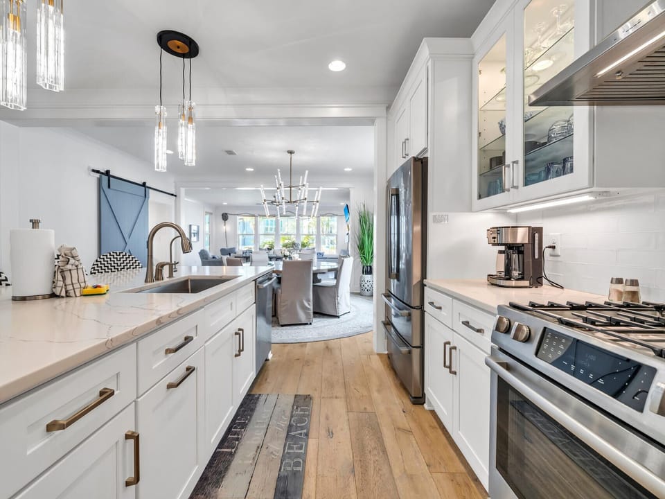 The kitchen is fully stocked, and includes a great breakfast bar!