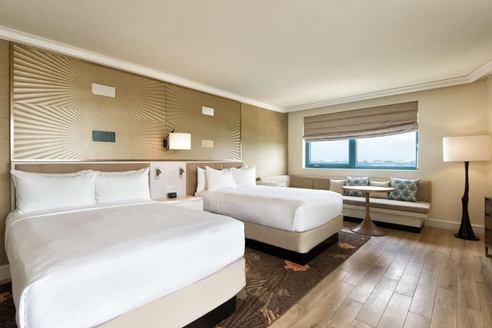 Unit with 2 Double beds. Exact unit will be assigned upon arrival. Views, colors, and decor may vary.