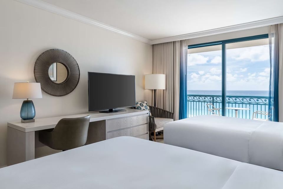 Unit with 2 Double beds. Exact unit will be assigned upon arrival. Views, colors, and decor may vary.