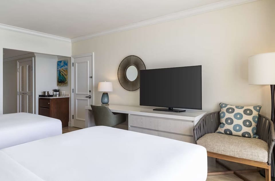 Unit with 2 Double beds. Exact unit will be assigned upon arrival. Views, colors, and decor may vary.