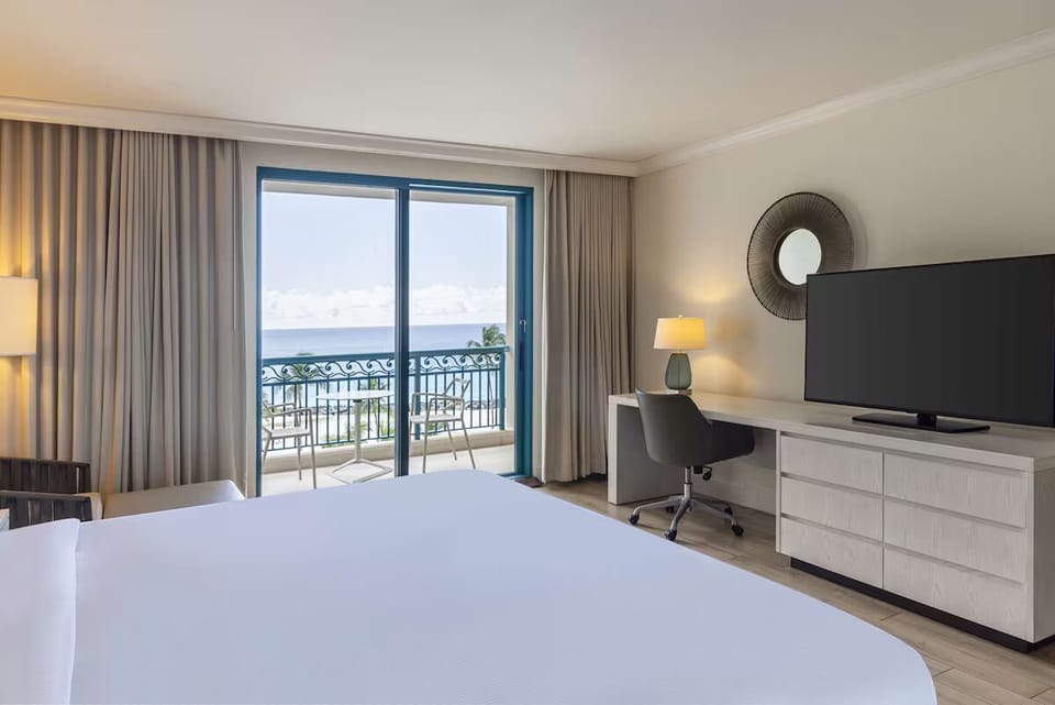 Unit with King bed. Exact unit will be assigned upon arrival. Views, colors, and decor may vary.