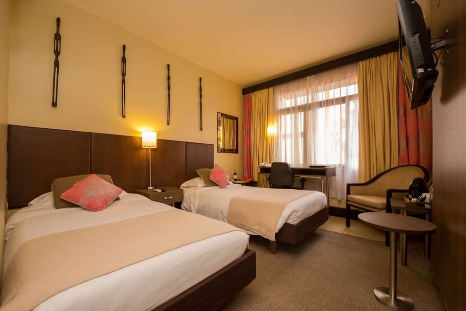 Unit with 2 Twin beds. Exact unit will be assigned upon arrival. Views, colors, and decor may vary.