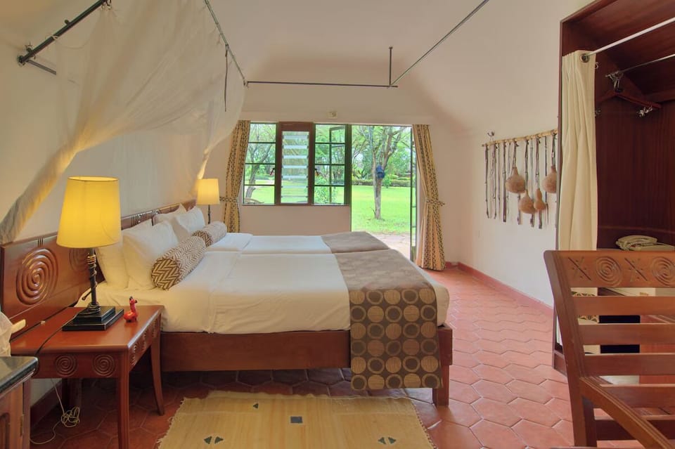 Unit with 2 Twin beds. Exact unit will be assigned upon arrival. Views, colors, and decor may vary.