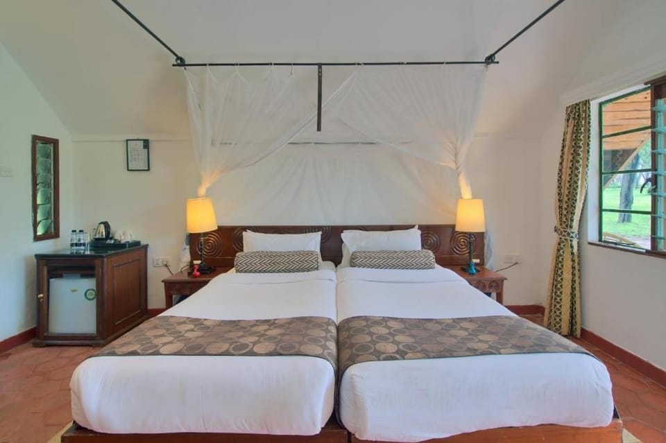 Unit with 2 Twin beds. Exact unit will be assigned upon arrival. Views, colors, and decor may vary.