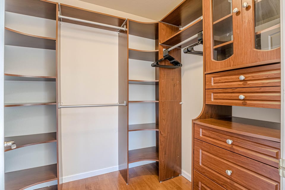 Your own private walk-in closet ensures you have plenty of room to unpack and settle in, making this dreamy sanctuary feel like home away from home.