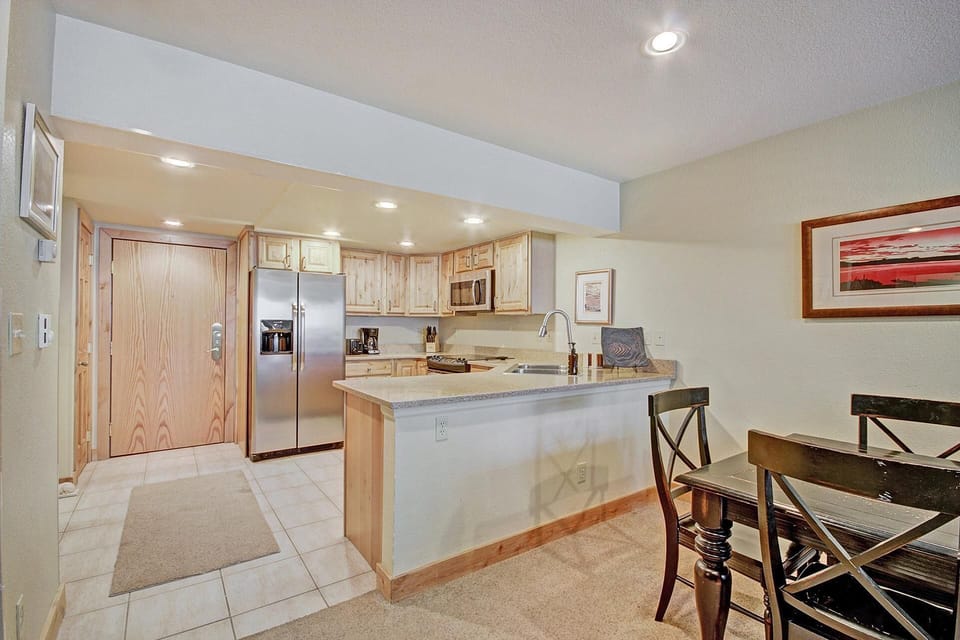 Updated kitchen with open dining area.