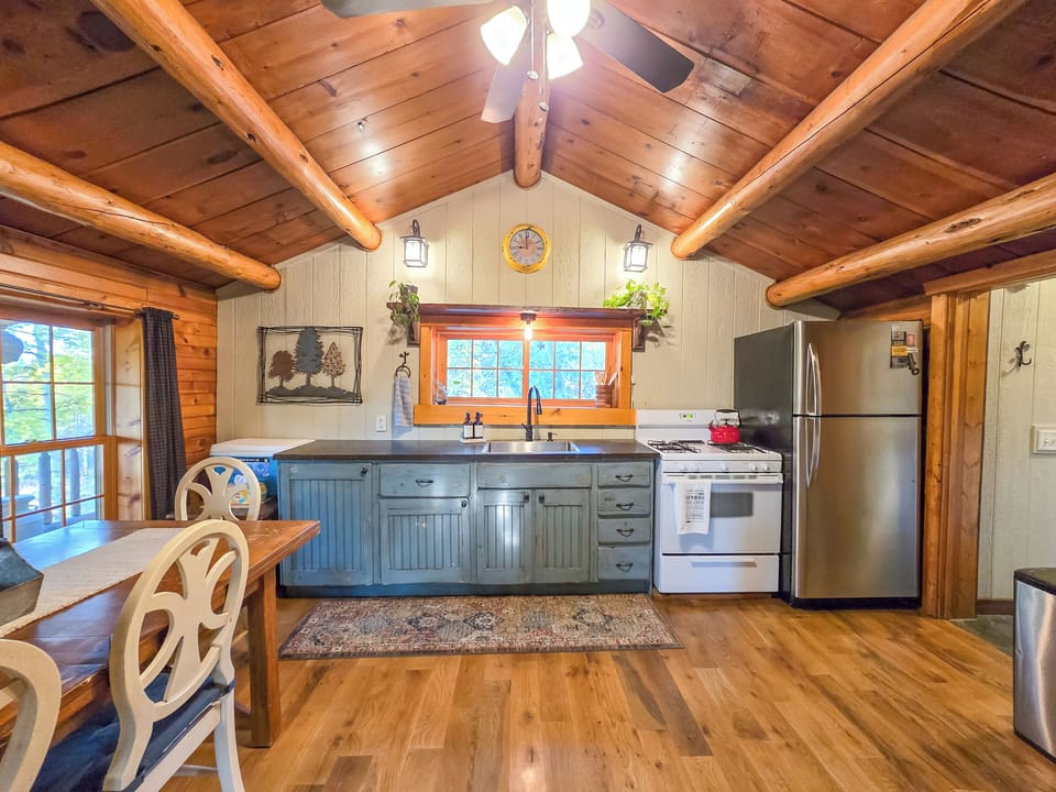 The fully-furnished kitchen and dining area is designed for you to cook and enjoy your meals. You'll find everything you need, including coffee, a crockpot, and a full suite of cooking amenities to make your stay comfortable and convenient.