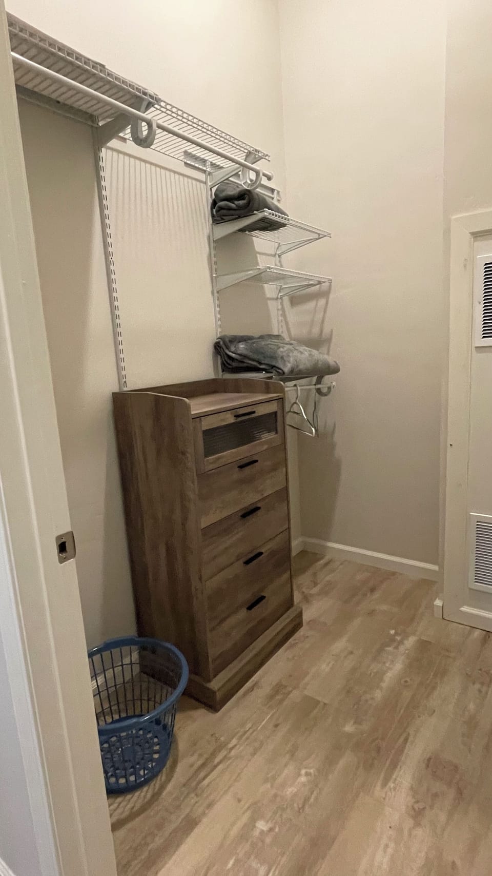 Closets are the same, both have hanging and a dresser.  
