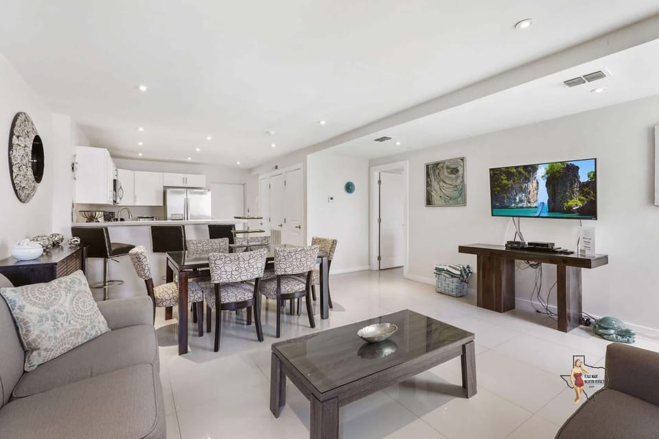 As you step inside, be welcomed by a luminous open living area.