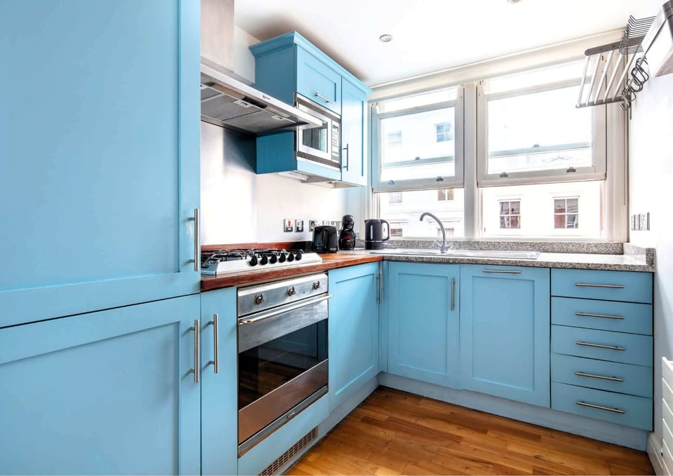 The kitchen is fully equipped to prepare a simple meal 