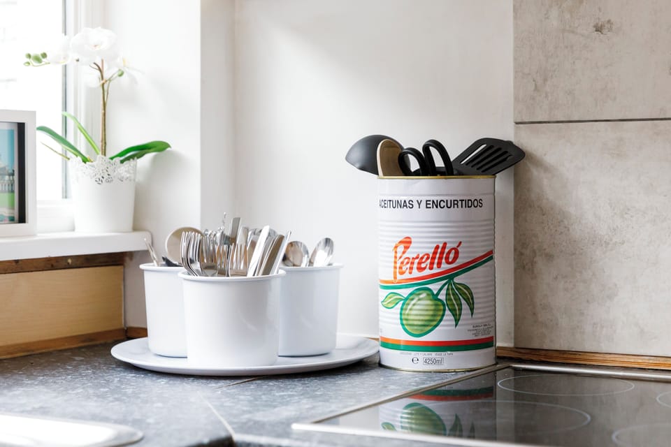 Utensils ontop of kitchen counter 