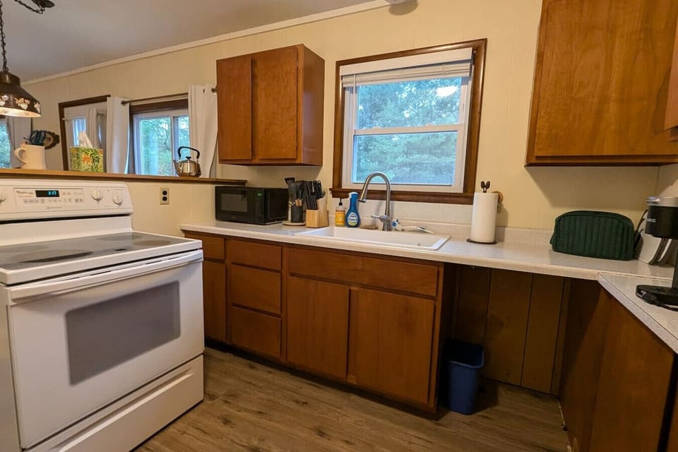 As you step into the kitchen, the clean lines and functional design make you eager to start cooking your favorite dishes.