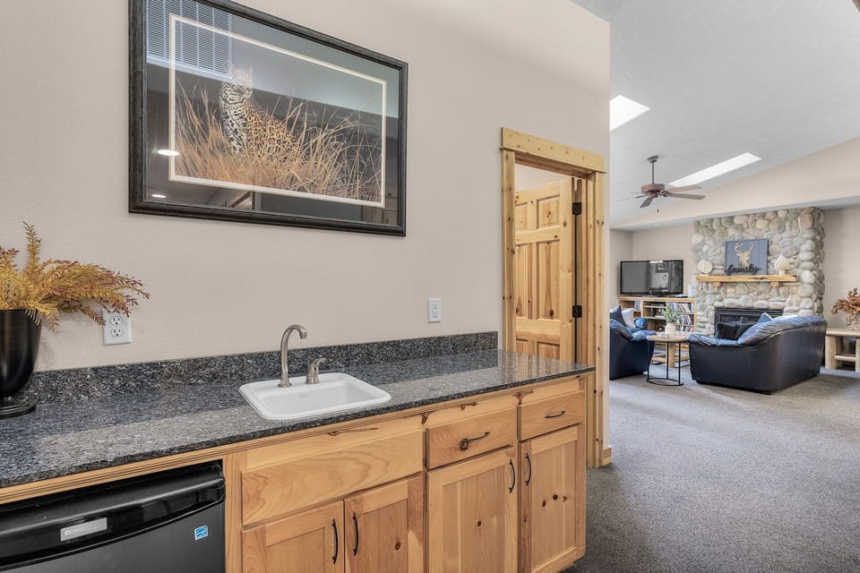 Downstairs Wet bar with mini fridge