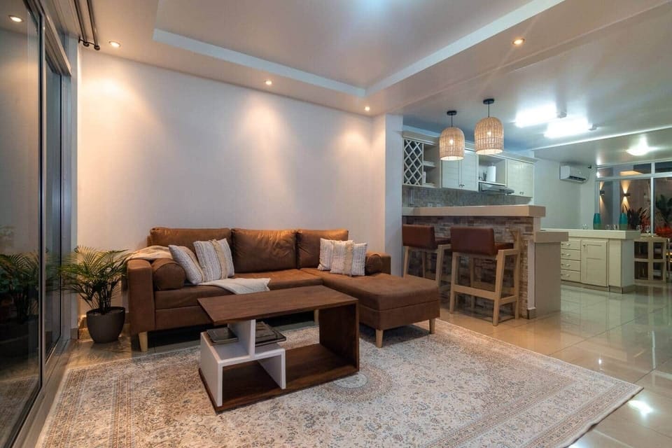 Whether you want to curl up on the couch and watch a movie after a long day of exploring, or catch up on your favorite shows during your downtime, our living room area is the perfect place to do so. We want you to feel right at home during your stay