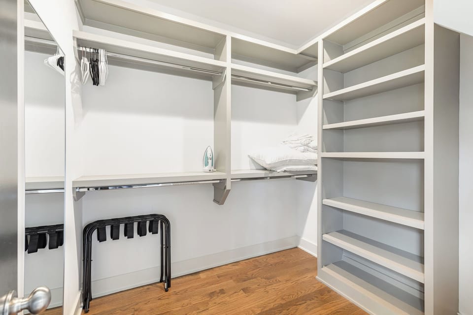 2nd Floor: 2nd bedroom with a King bed, smart TV, large walk-in closet, and en-suite bathroom.