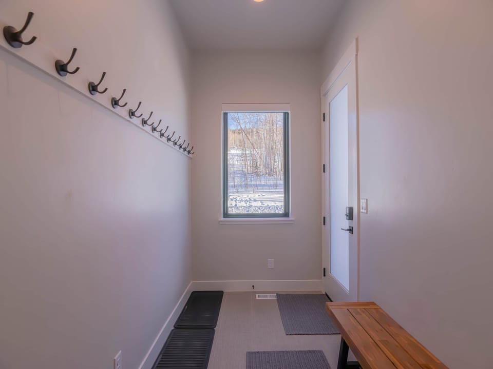 Ski valet with scenic aspen tree views.