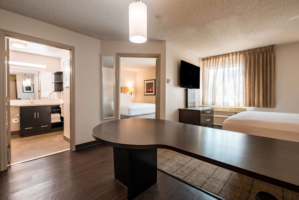 Gather at the table, then relax in your spacious suite.