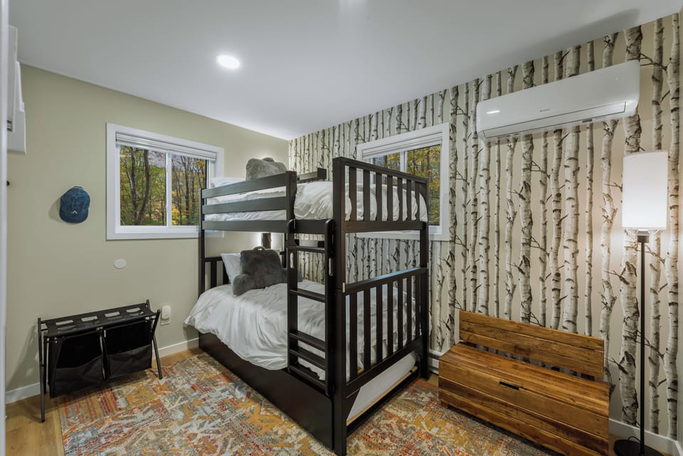 Bedroom 3 features a twin bunk bed and a twin trundle.