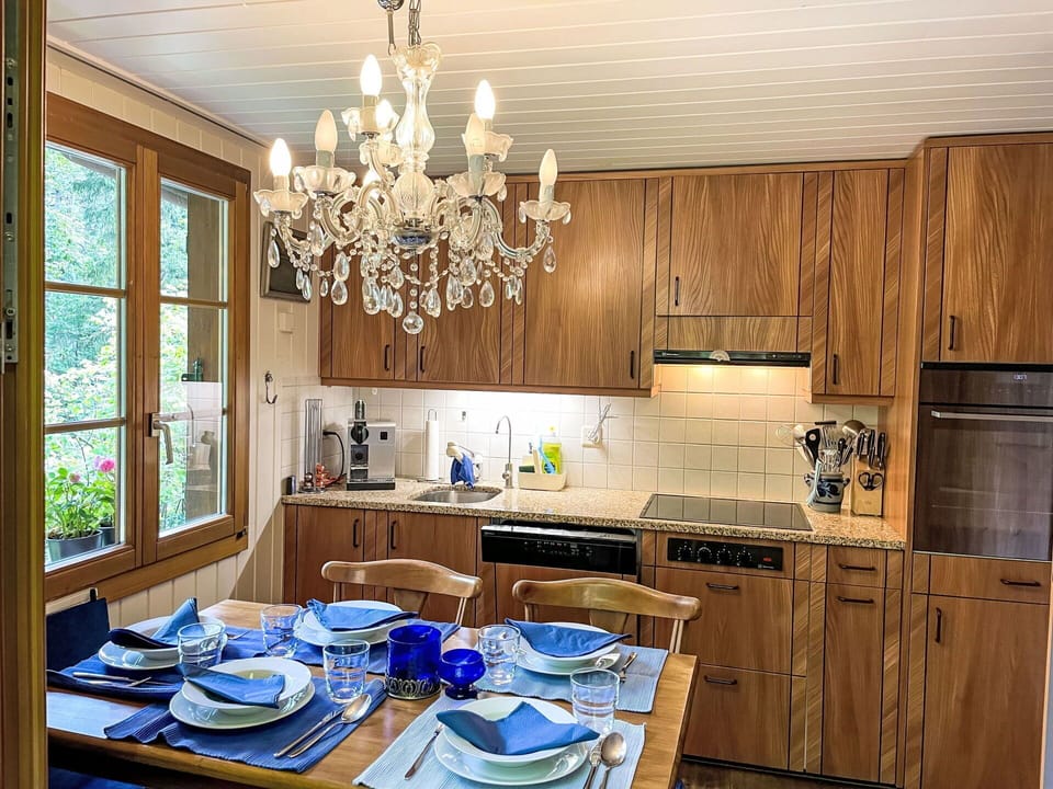Property, Cabinetry, Countertop, Wood, Table, Lighting, Window, Interior Design, Kitchen, Dishware