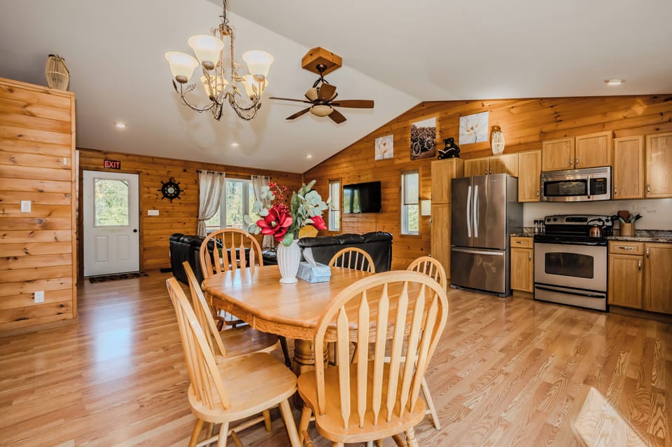 The open kitchen with modern appliances and ample space for cooking and socializing with family and friends.
