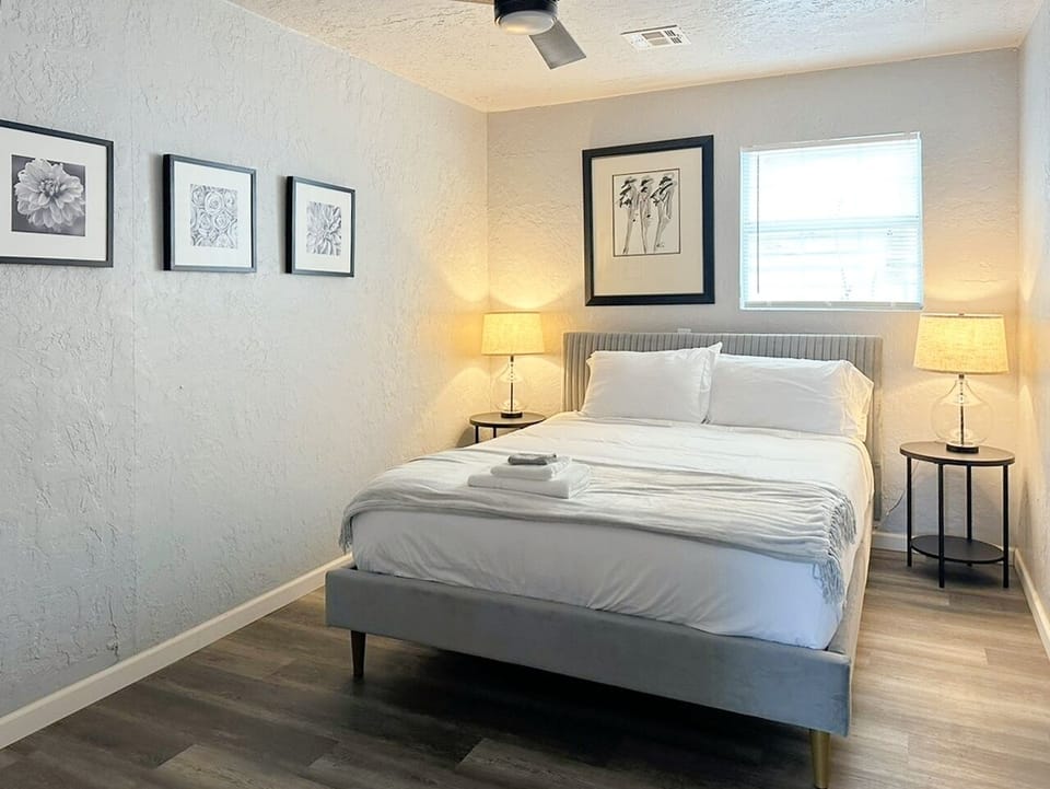 Relax in our cozy bedroom, complete with a comfortable bed and plush linens.