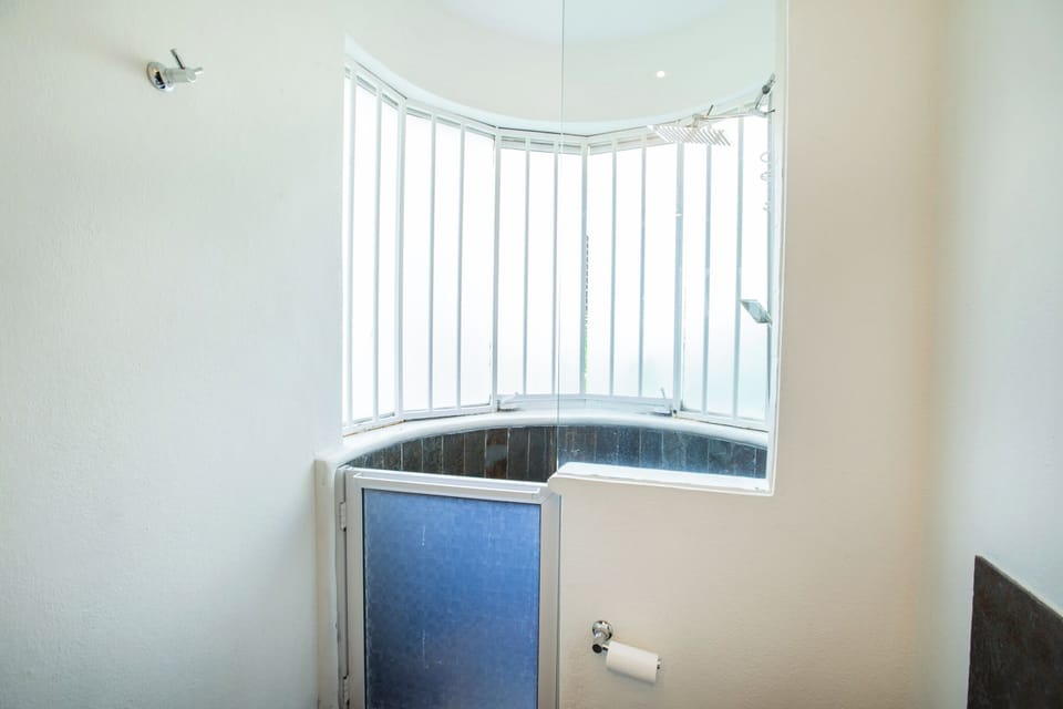 Full Bathroom with Rain Shower Head