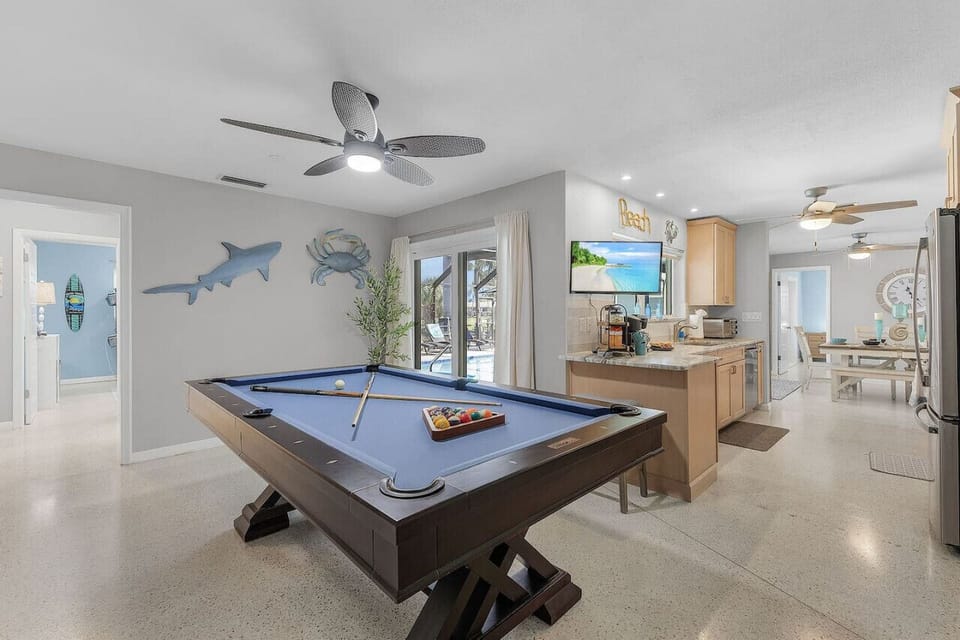 Billiard Room leading into the kitchen and guest rooms