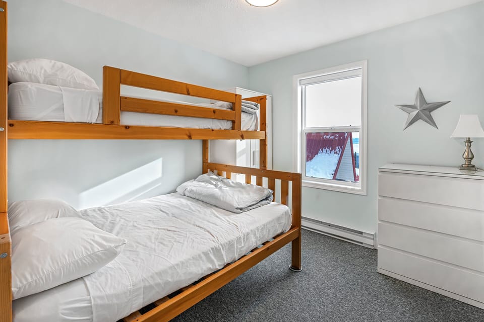 Features a single double bunk bed.