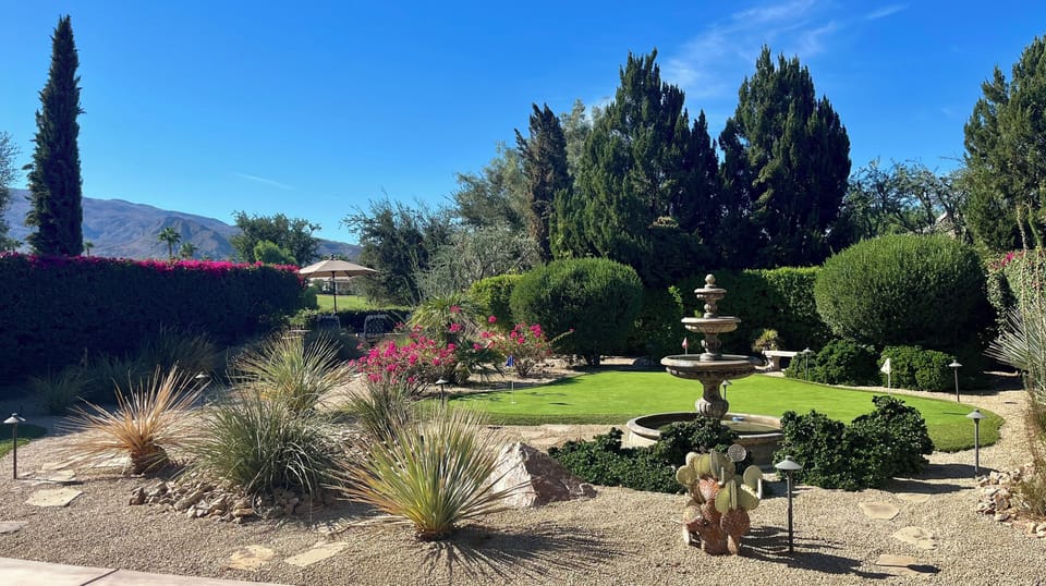 Back yard putting green and fountain