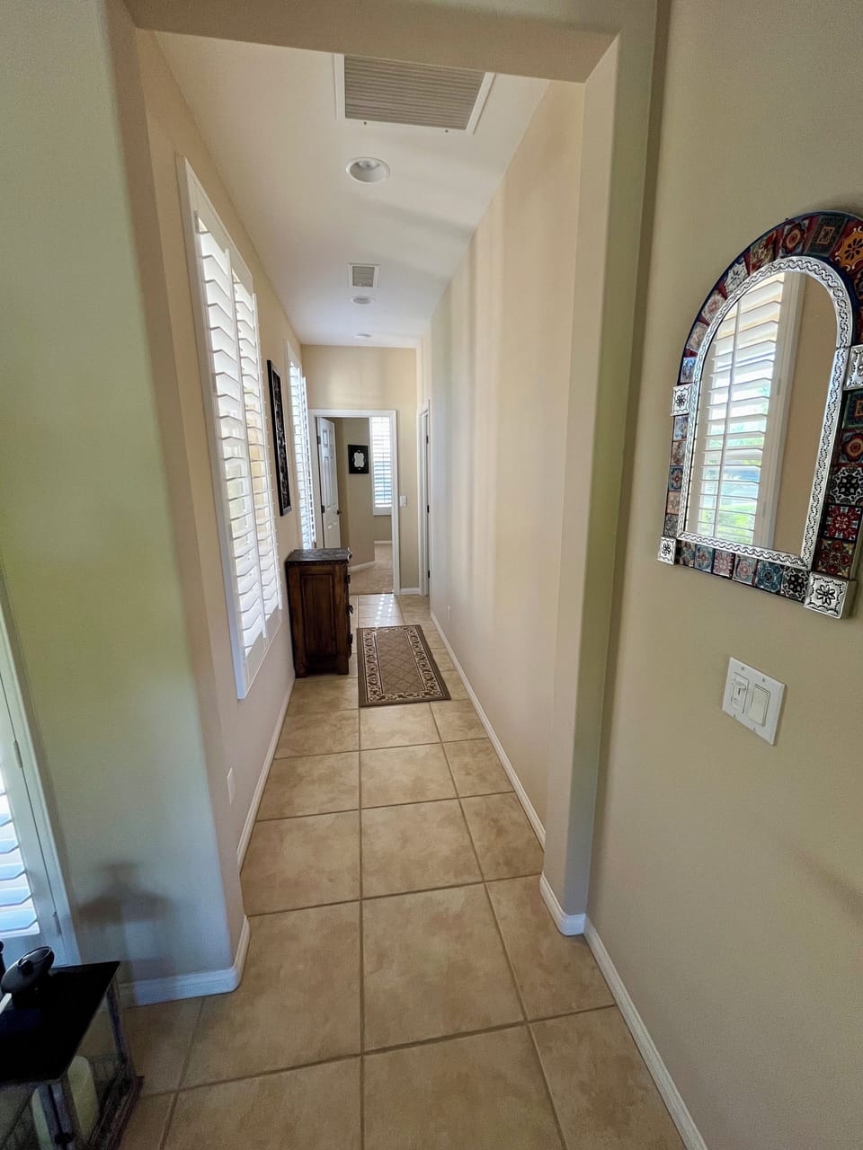 Hallway to guest quarters on opposite side of home
