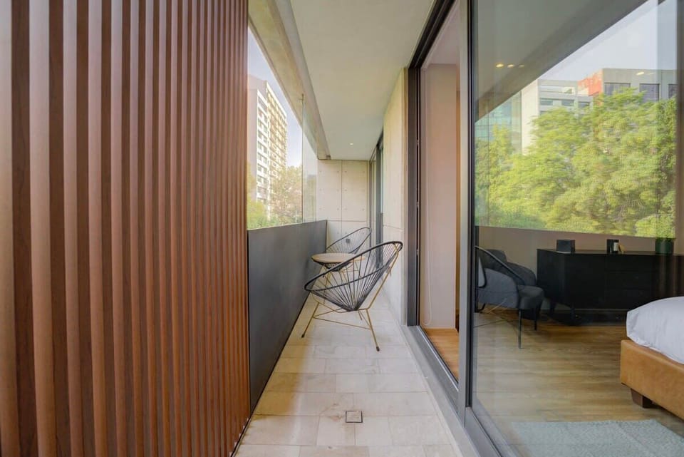 Wake up to stunning city views from your private balcony.


