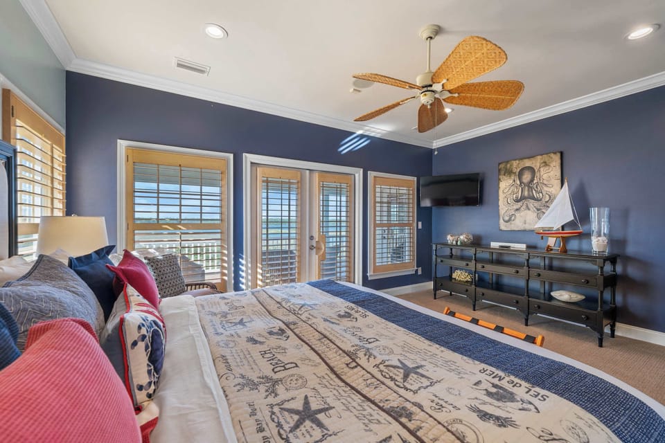 Queen-sized Bed with a smart TV