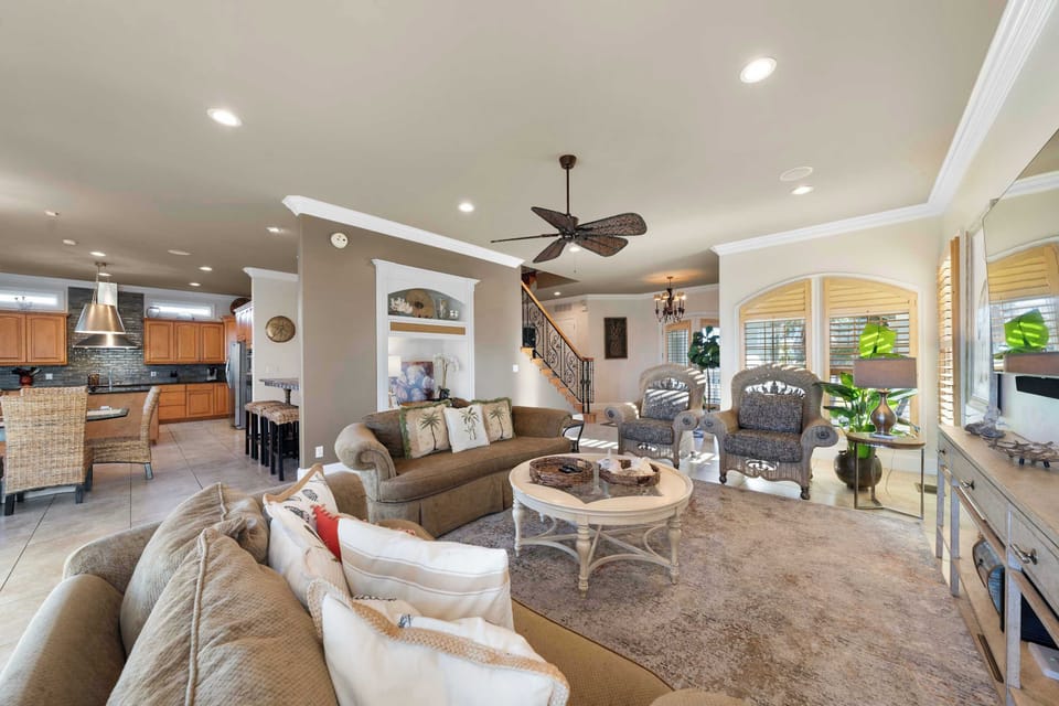 Step into luxurious living with expansive windows and plush seating—bask in natural light while relaxing in style.