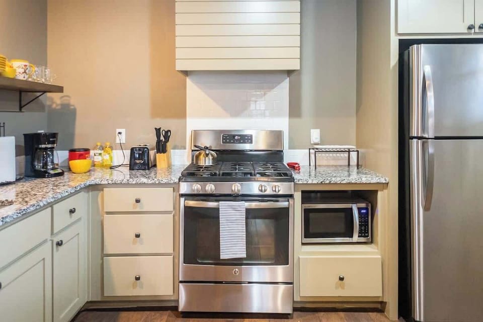 A sleek and modern oasis with these stainless steel appliances.