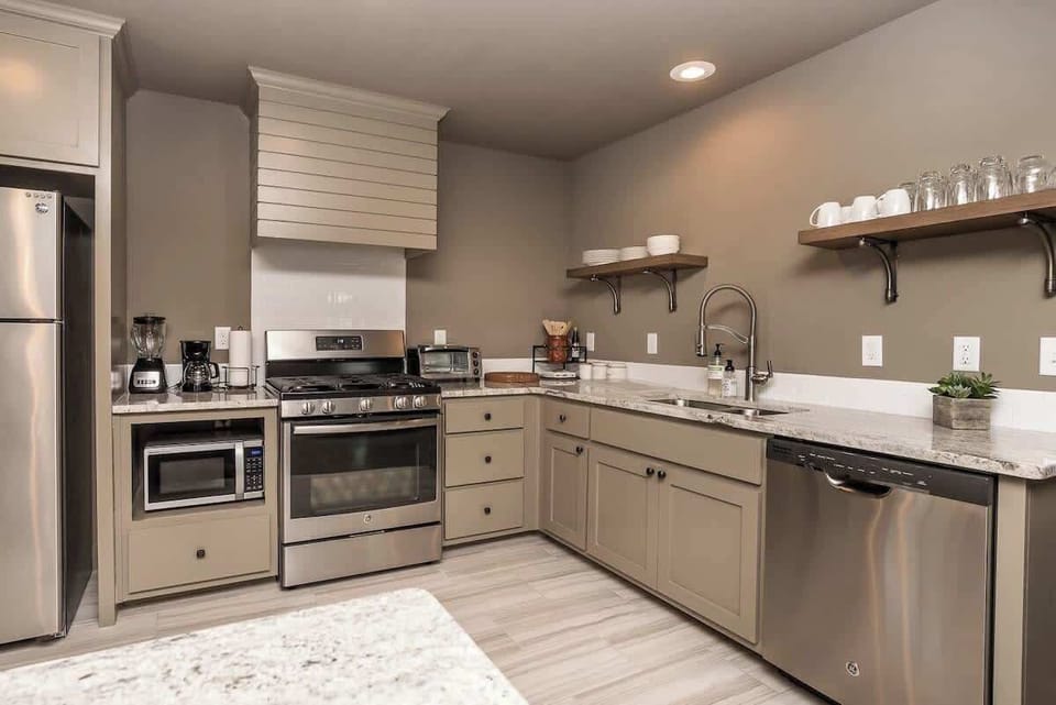 A kitchen with sleek white cabinets for a modern and elegant look.