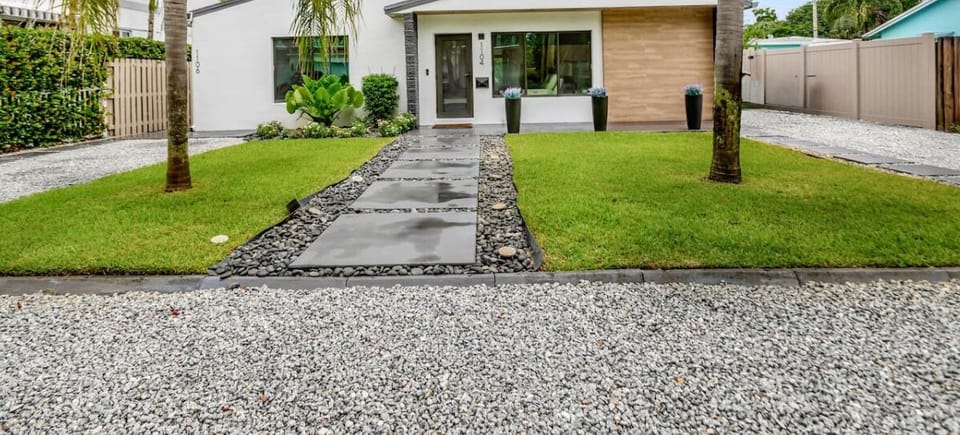 The house stands proudly with its unique character and curb appeal.