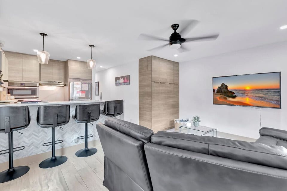 Contemporary elegance shines in the interior of Unit 1.