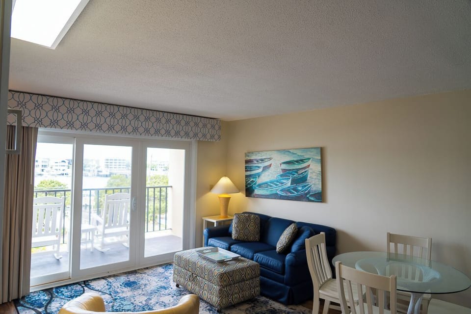 Cozy, intimate living room with a queen murphy bed