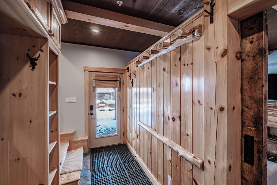 Enjoy the lower level, with convenient ski/snowboard storage and slope access.