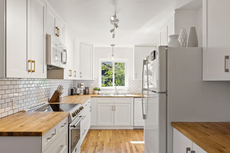 Enjoy cooking meals in the fully stocked kitchen with friends and family.