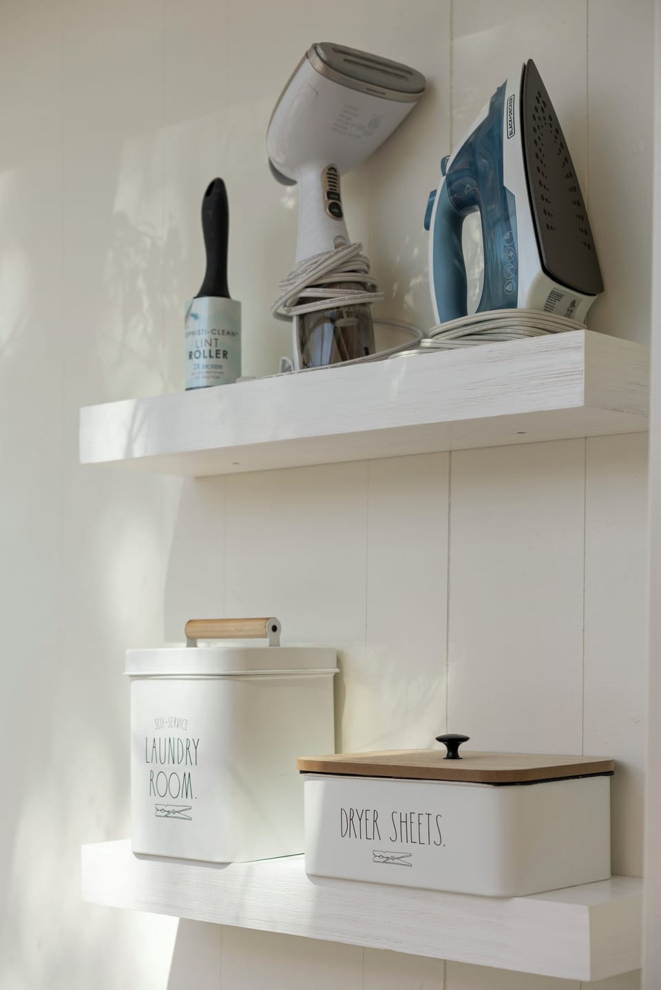 A steamer, iron, ironing board, and laundry detergent are all provided for guests. 